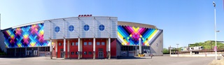 Façade du bâtiment colorée de pixels