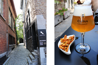 Een glas Curtius bier met nootjes op een terras