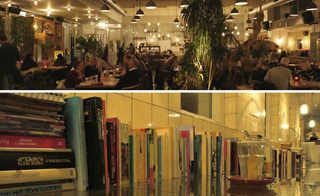 Gasten aan tafel en rij boeken in de Brandweerkantine in Maastricht